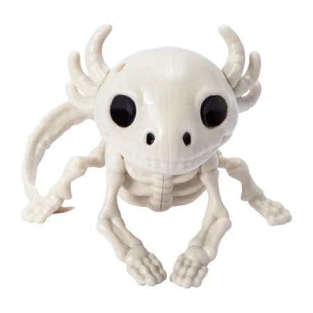 Front view of a white Halloween skeleton axolotl decoration with black eyes, curved gills and a long tail sold by LFG Energy Club.