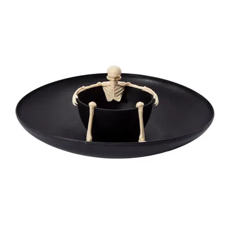 Front view of a black Halloween chip-and-dip tray with a center bowl and bone-colored skeleton decoration sold by LFG Energy Club.