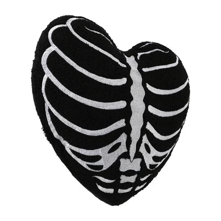 Angled view of the black Halloween heart pillow showing the white rib cage design and heart-shaped form sold by LFG Energy Club.