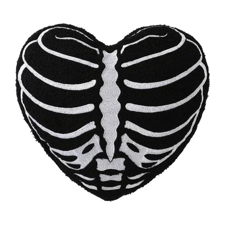 Front view of a black heart-shaped Halloween pillow with a white skeleton rib cage design sold by LFG Energy Club.