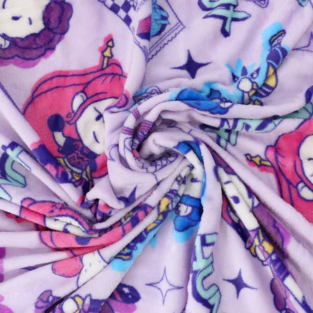 Open KPop Demon Hunters travel blanket displaying the colorful all-over chibi character pattern on a light-purple background sold by LFG Energy Club