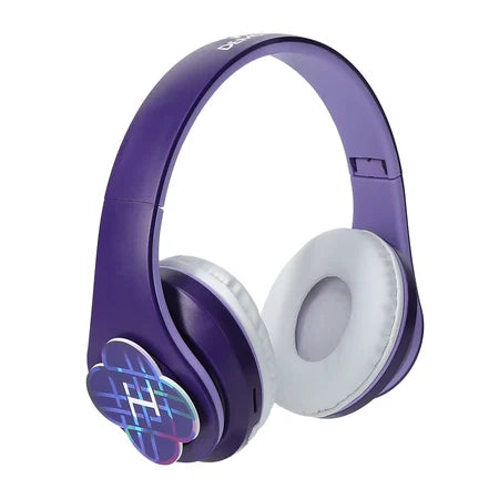 Three-quarter view of purple-and-white Netflix KPop Demon Hunters wireless headphones with colorful graphics on the earcups sold by LFG Energy Club.